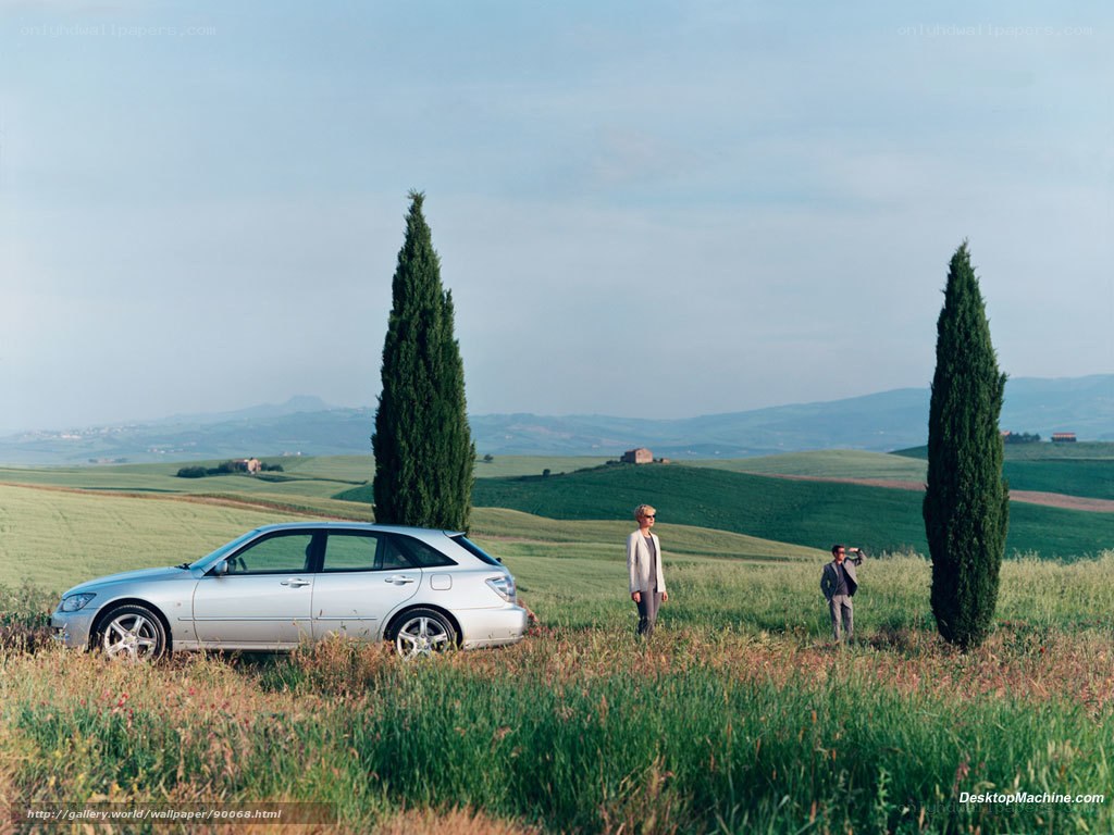 Car in a Tuscan field