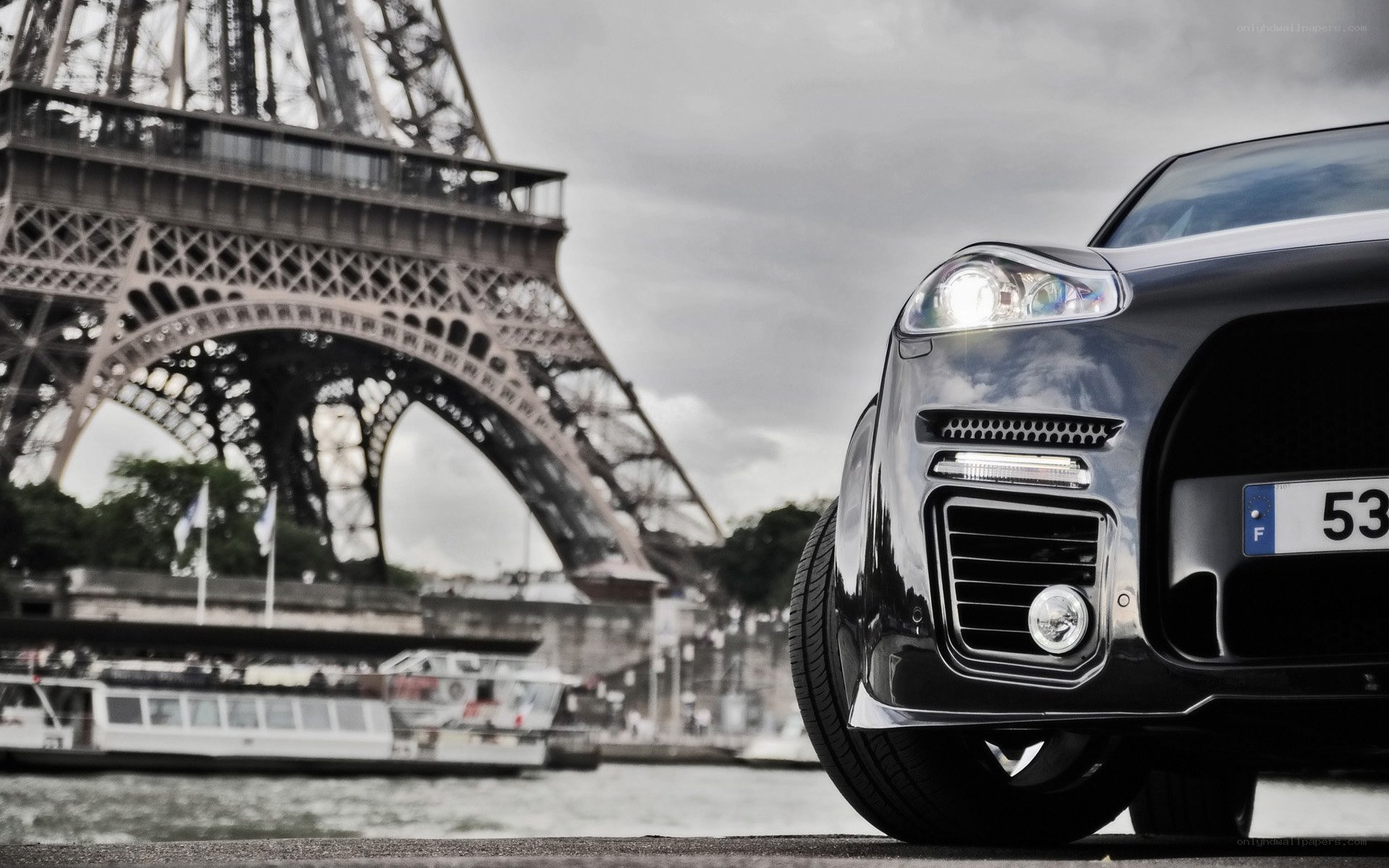 Car in front of Eiffel Tower