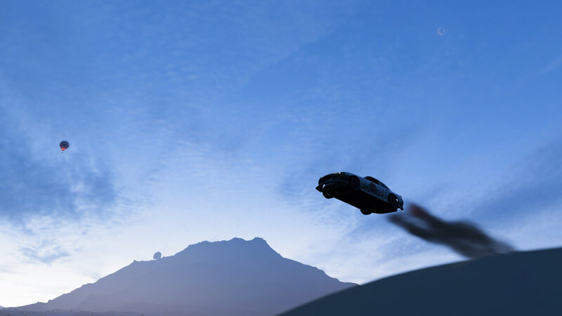 Car in Mid-air Jump — Blue