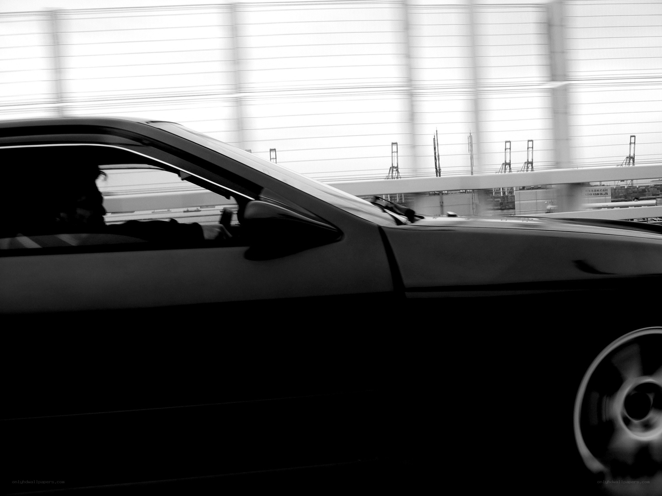 car in motion on a bridge