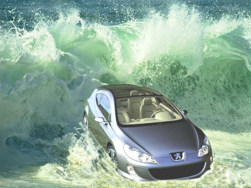 Car in ocean wave