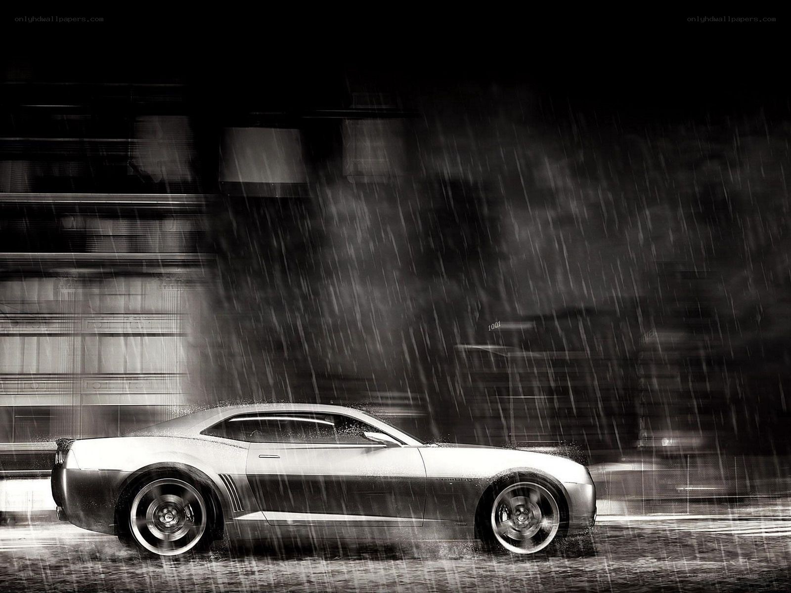 Car in rain at night