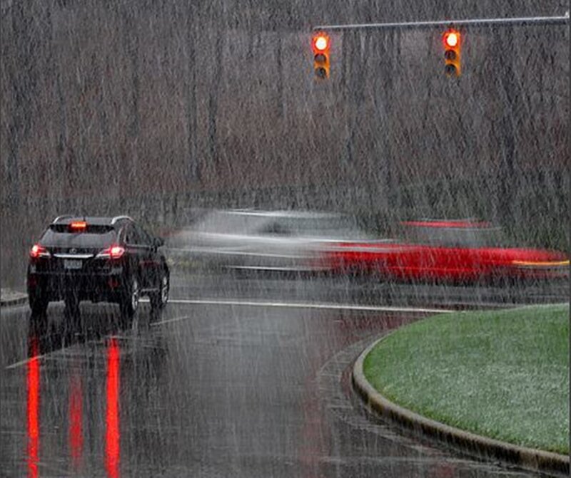 Car in Rainstorm