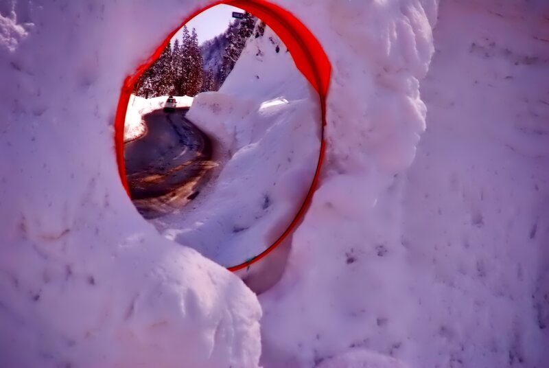Car in Snow Tunnel