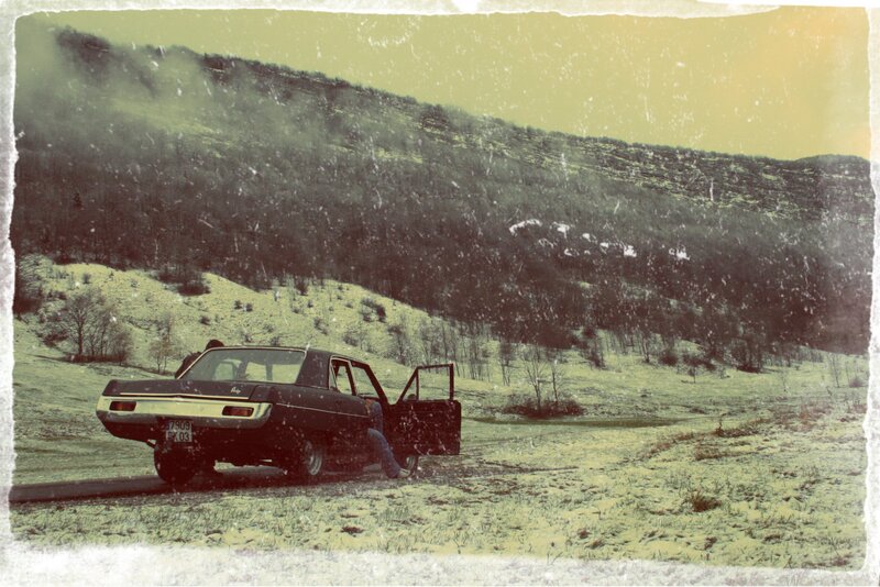 Car in snowy landscape