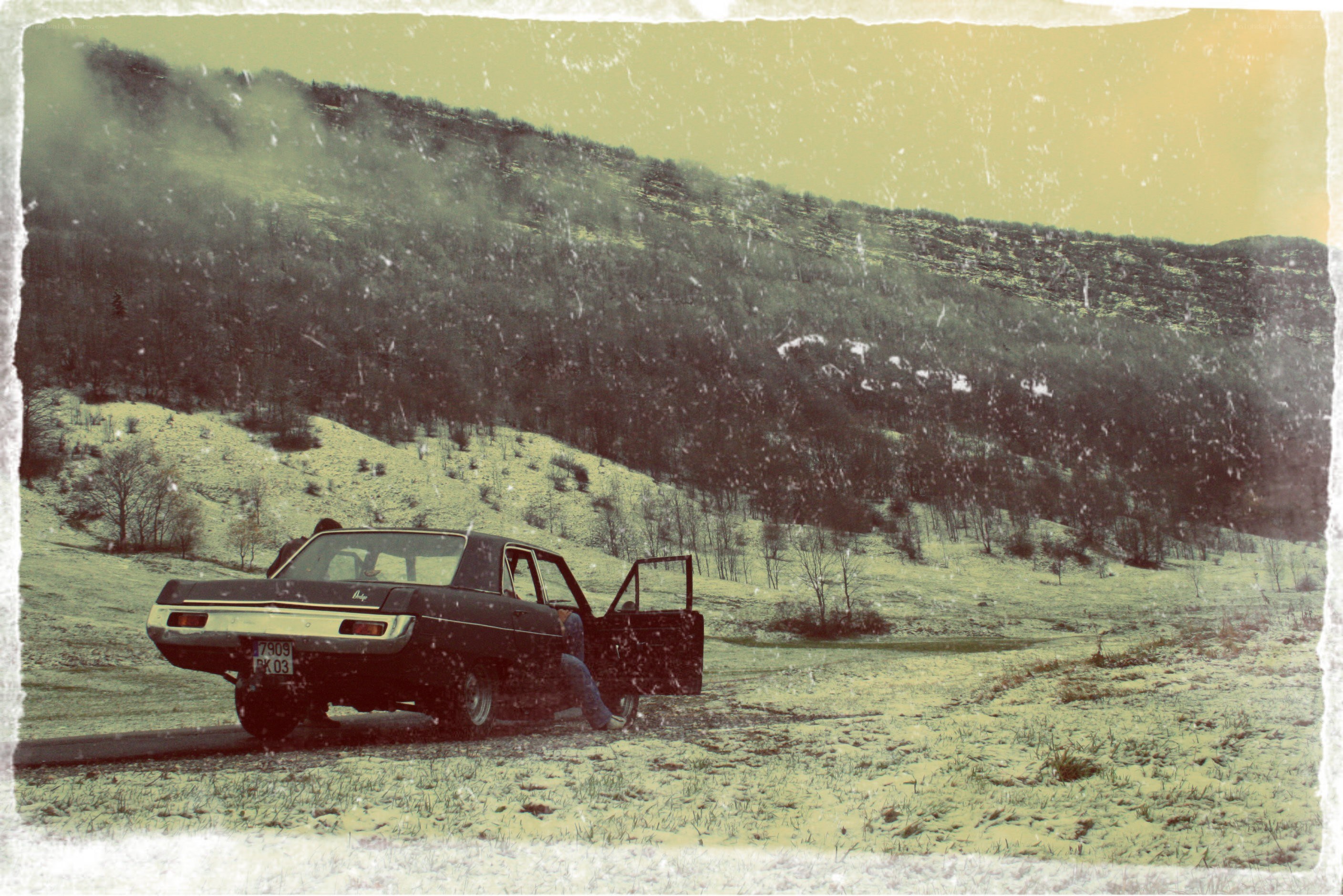 Car in snowy landscape