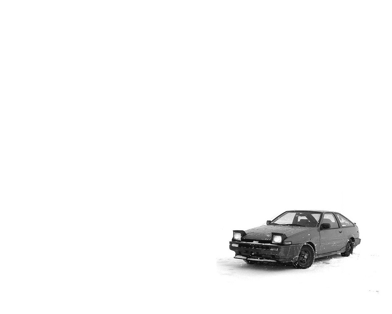 car in snowy landscape