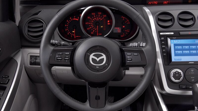 Car Interior Dashboard — Black, Neutral, Photograph, Steering Wheel, Instrument Cluster, Infotainment Screen, Gray, Red
