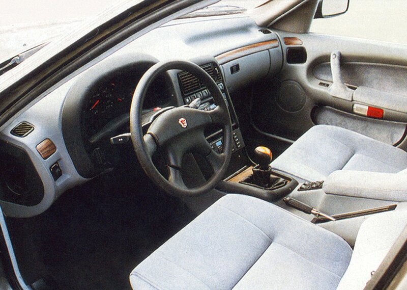 Car Interior — Gray, Neutral, Photograph, Steering Wheel, Gear Shift, Seats