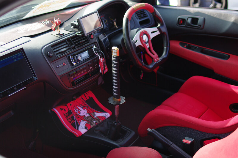 car interior with anime decor