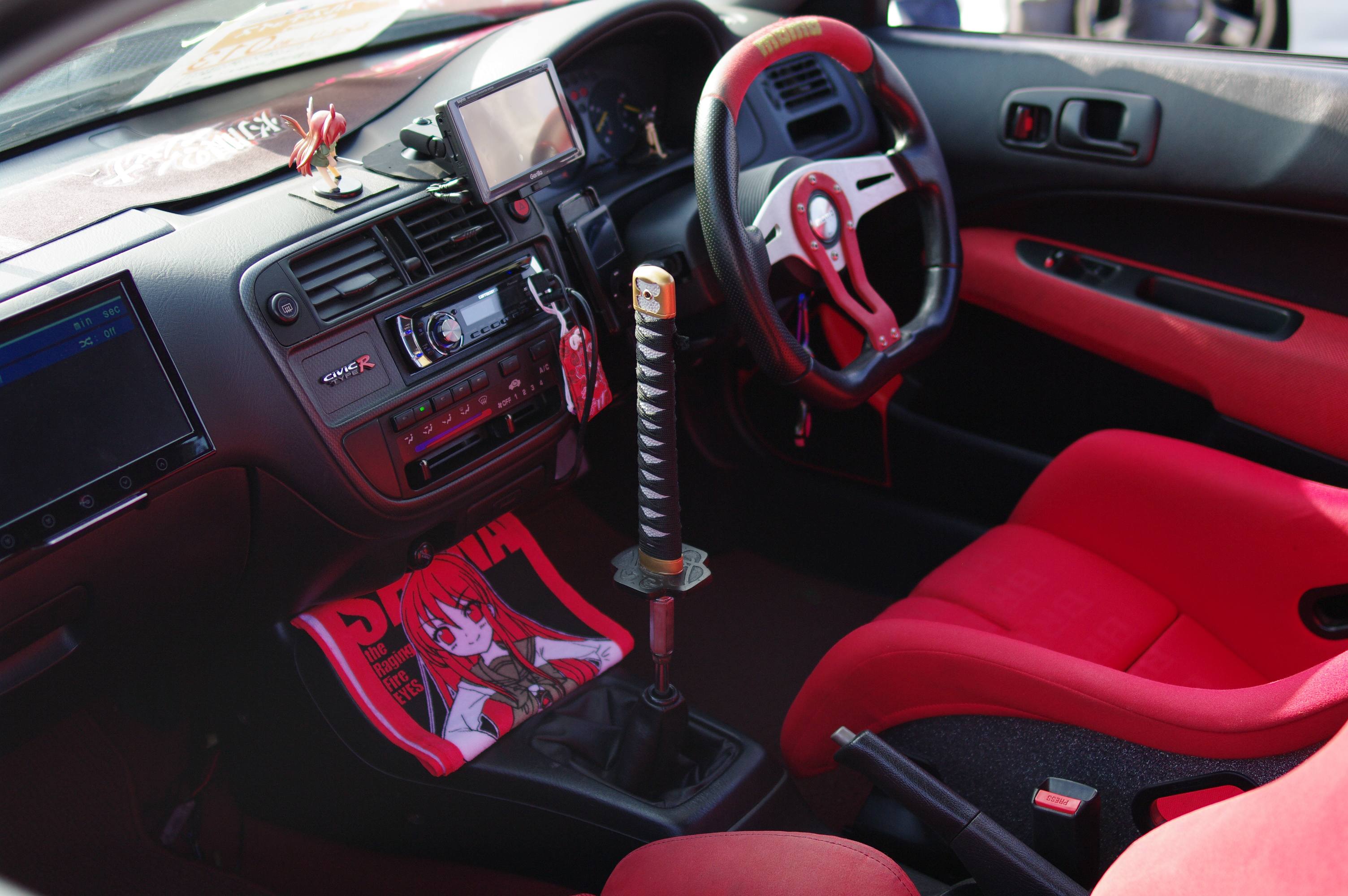 car interior with anime decor
