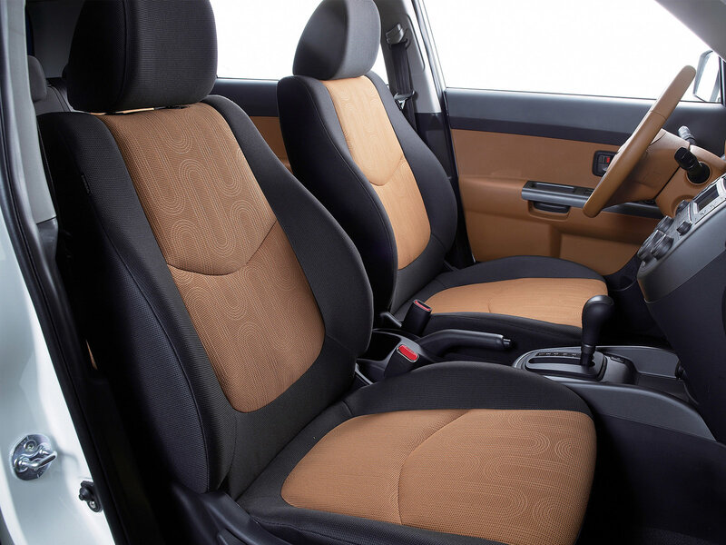 car interior with brown and black seats