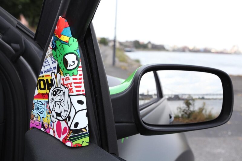 car interior with colorful air freshener