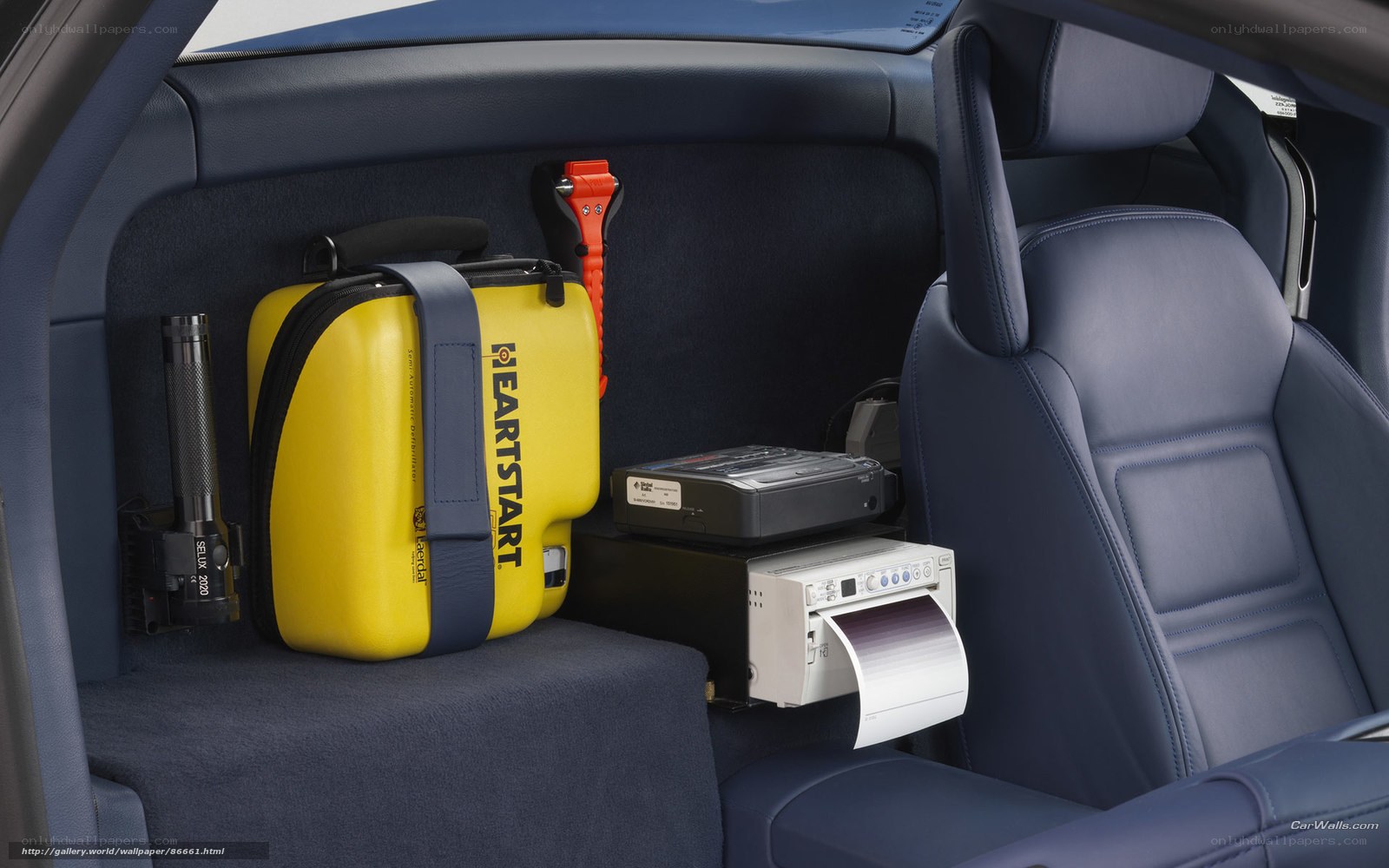 Car interior with emergency equipment