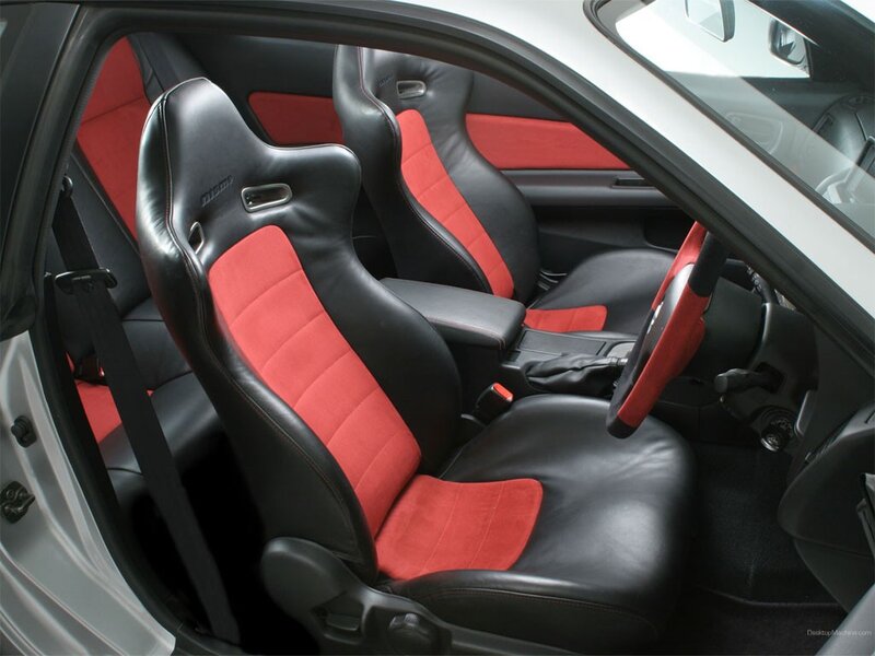 car interior with red and black seats