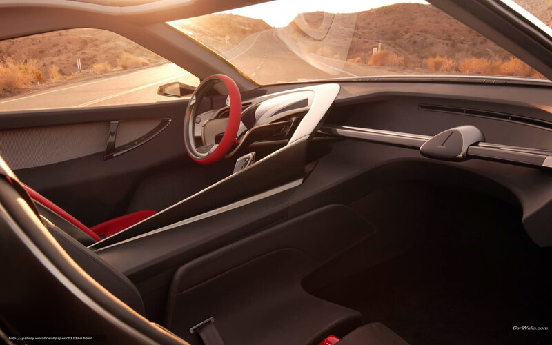 car interior with red steering wheel