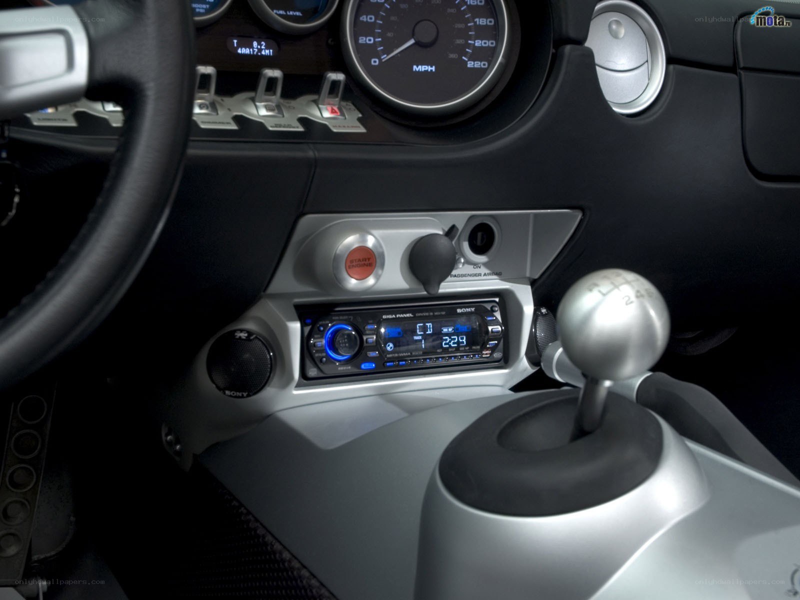 car interior with stereo and gear shift