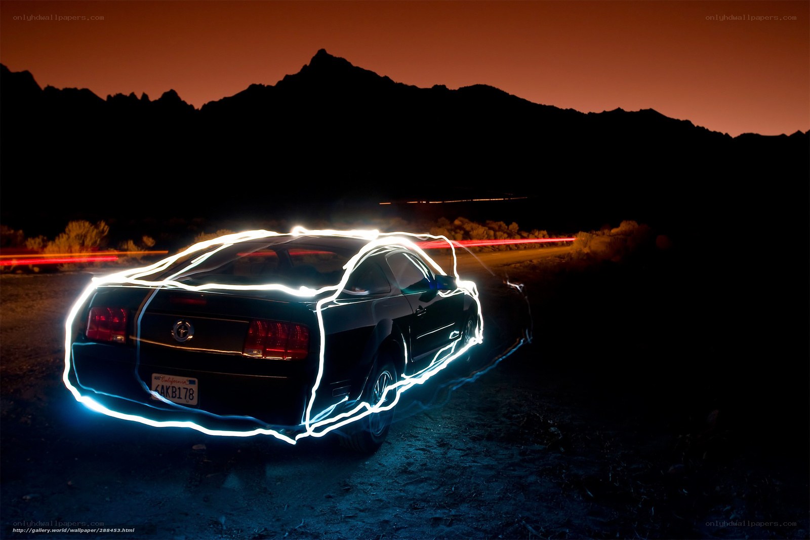 Car light painting at dusk