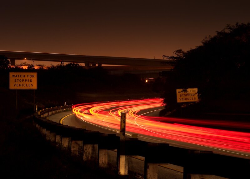 Car Light Trails on Highway — Red