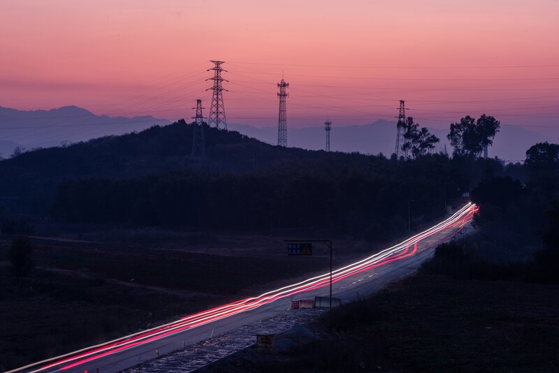Car Light Trails on Road — Pink