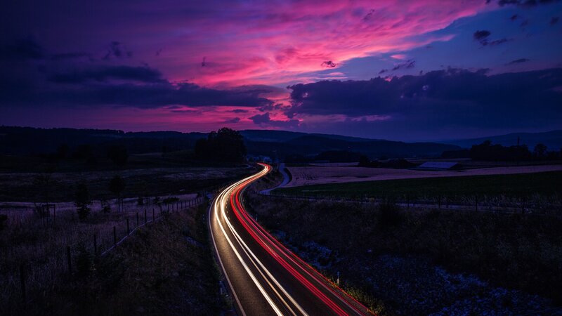 Car Light Trails on Road — Purple
