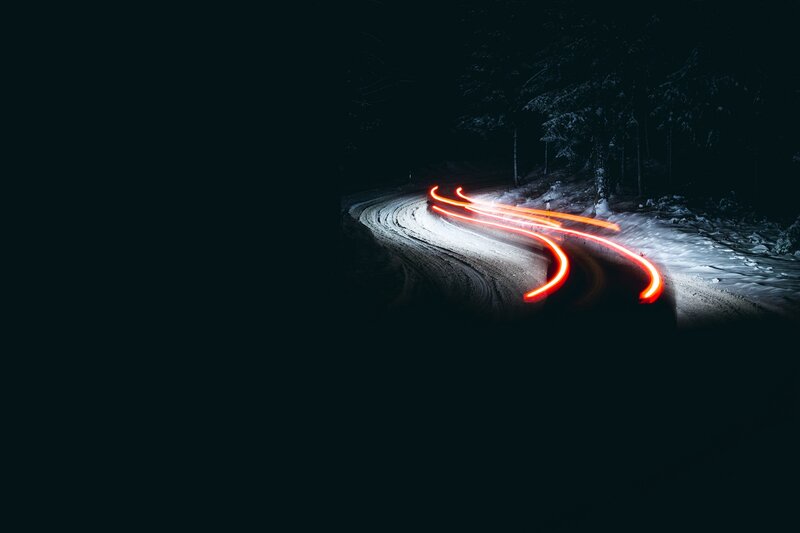 Car Lights on Snowy Road — Black, Dark