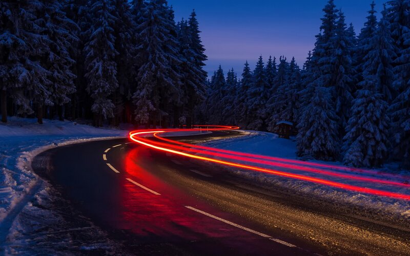 Car Lights on Snowy Road — Red, Dramatic