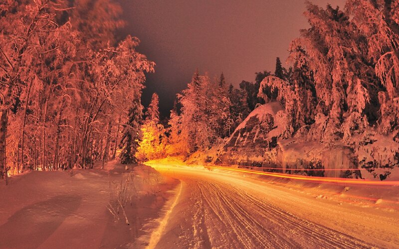 Car Lights on Snowy Road — Red