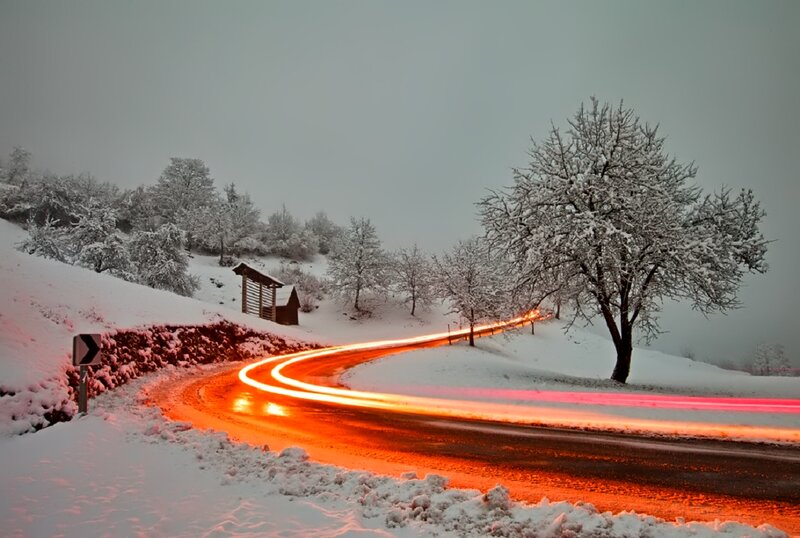 Car Lights on Snowy Road — White