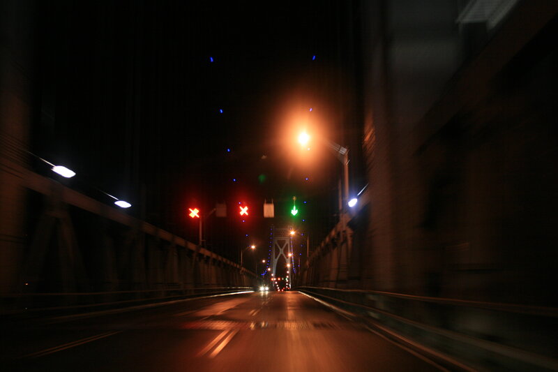 Car on a Bridge at Night