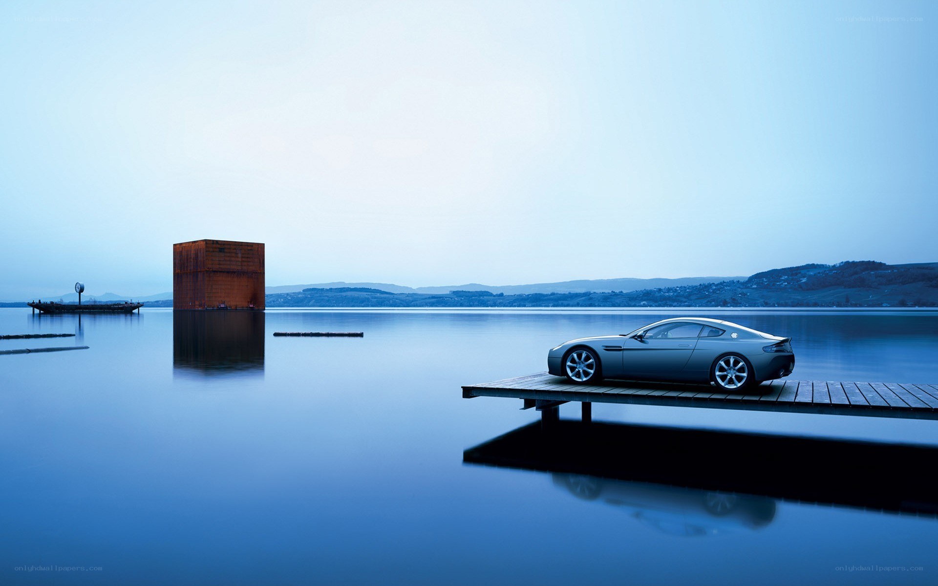 Car on a dock by the lake