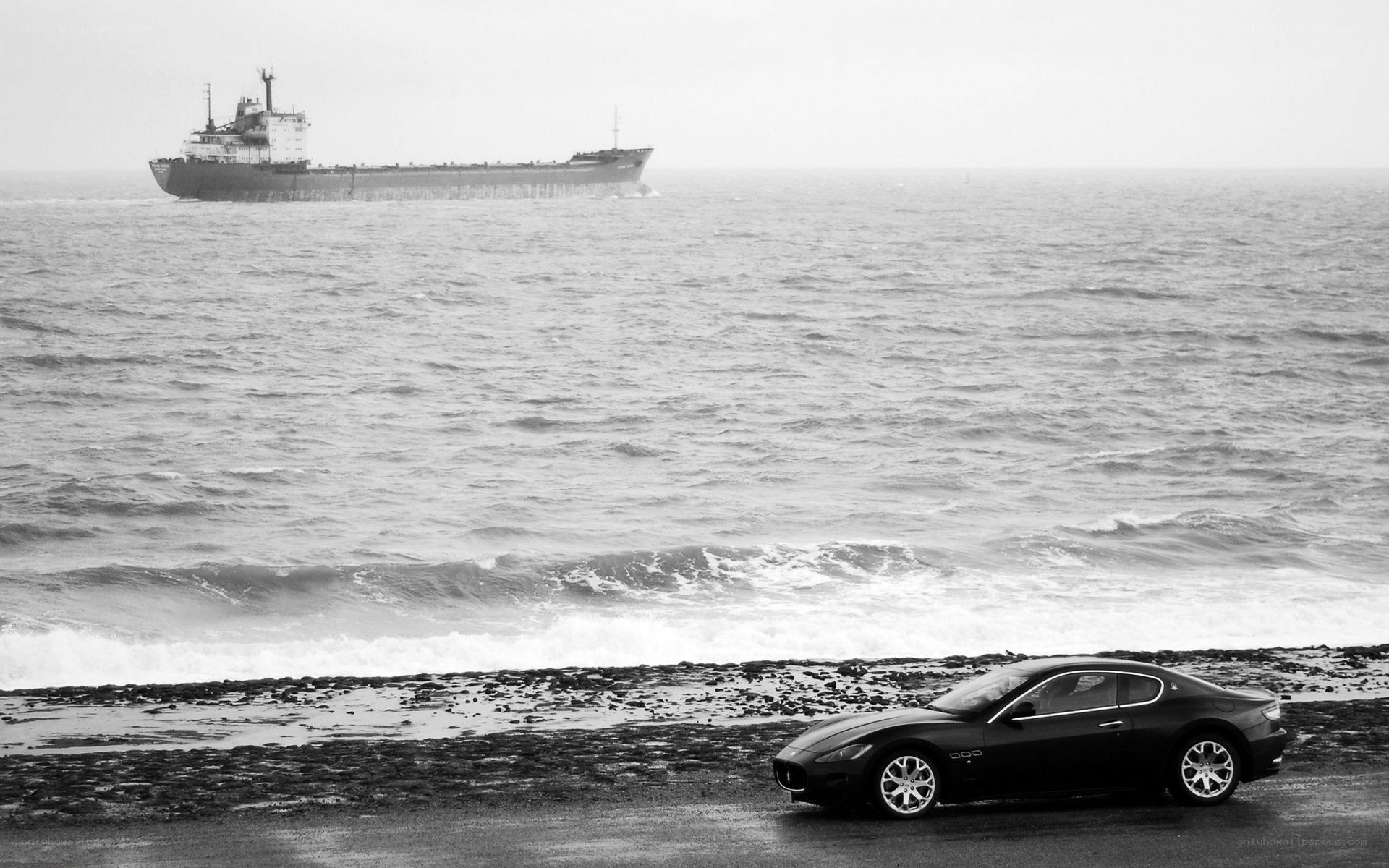 Car on a rocky shore