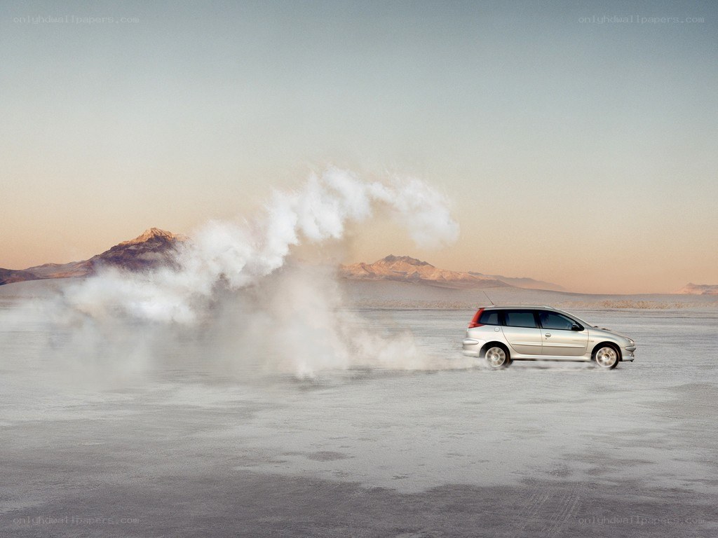 Car on a salt flat with smoke