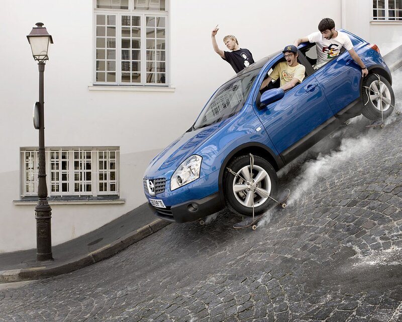 Car on a steep hill with skateboard wheels