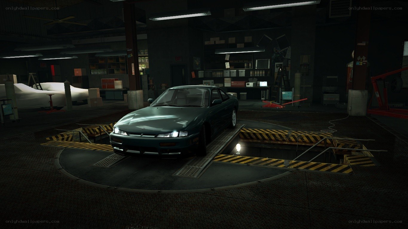 car on a turntable in garage