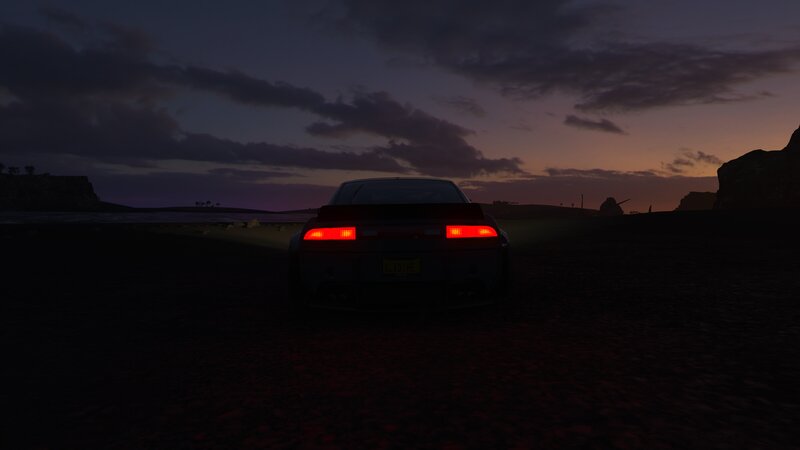 Car on Beach at Dusk