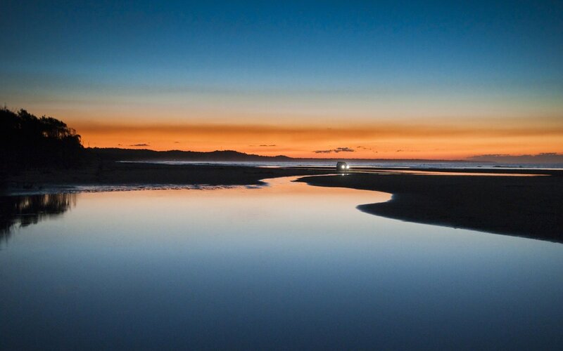 Car on Beach at Sunset — Blue