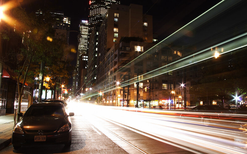 Car on City Street — Black