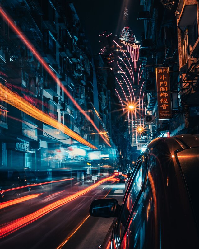 Car on City Street — Red