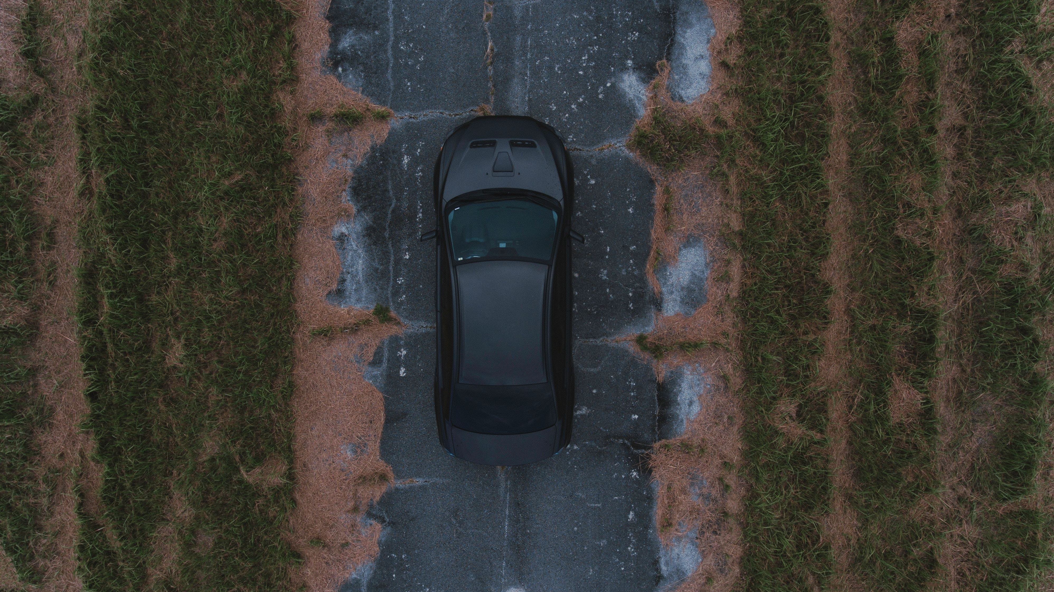 car on cracked road
