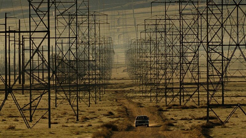 Car on Dirt Road — Brown