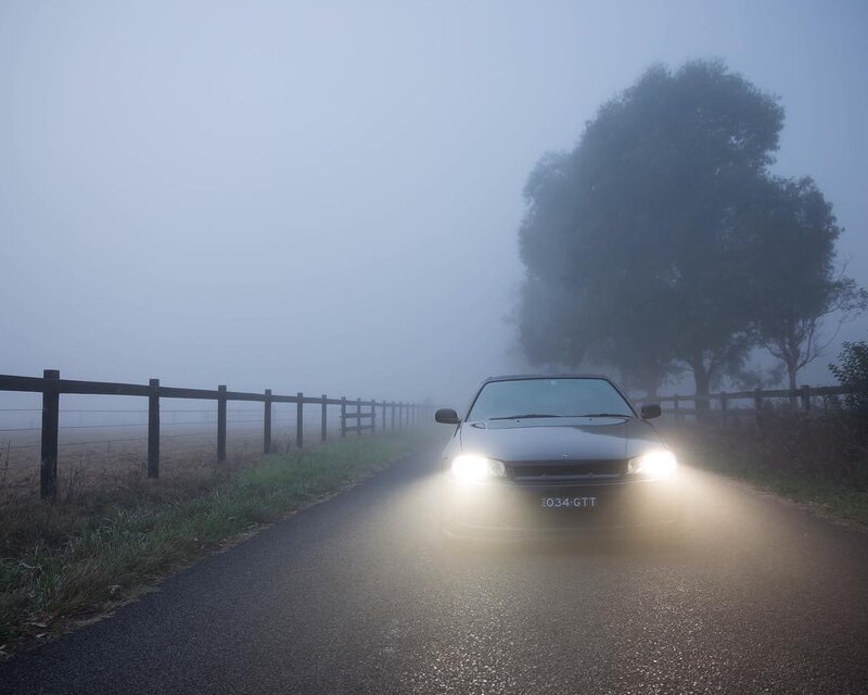 Car on Foggy Road — Gray, Misty