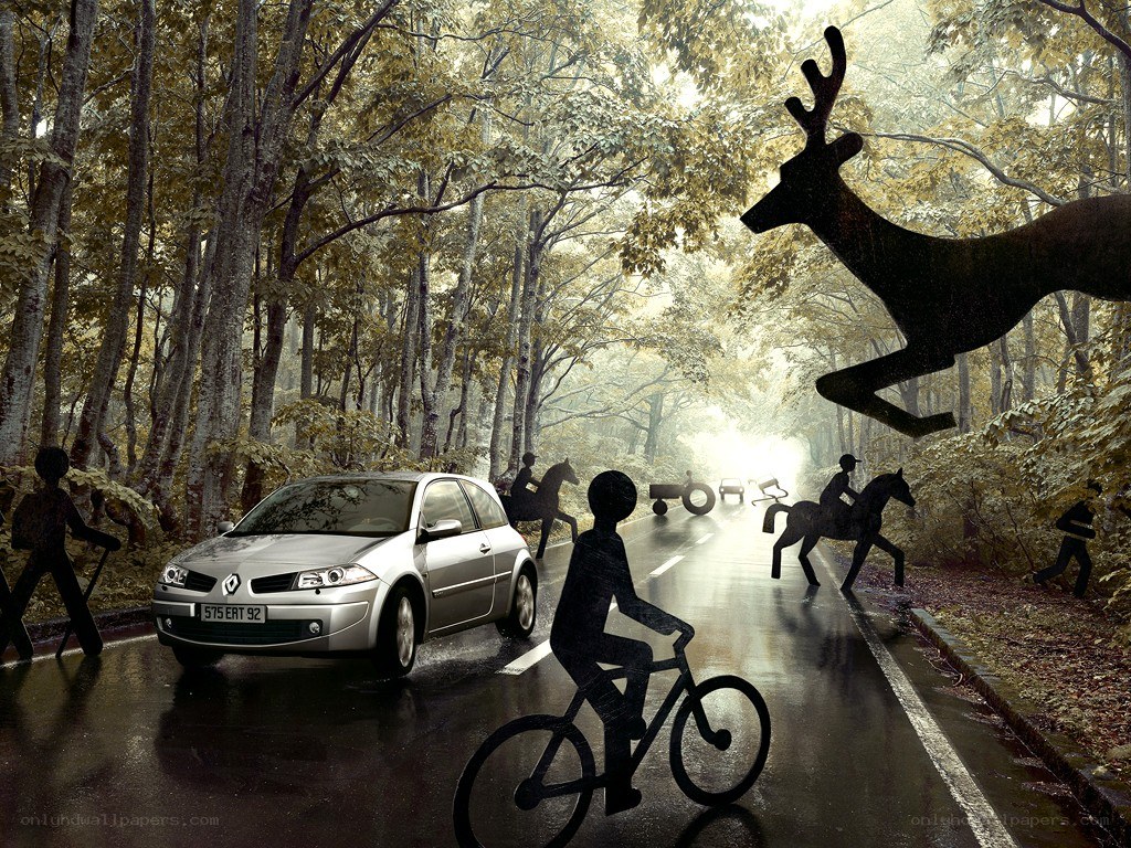 Car on forest road with silhouettes