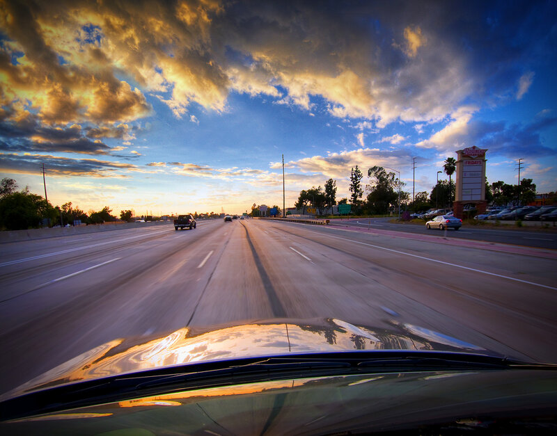 Car on Highway at Sunset — Blue