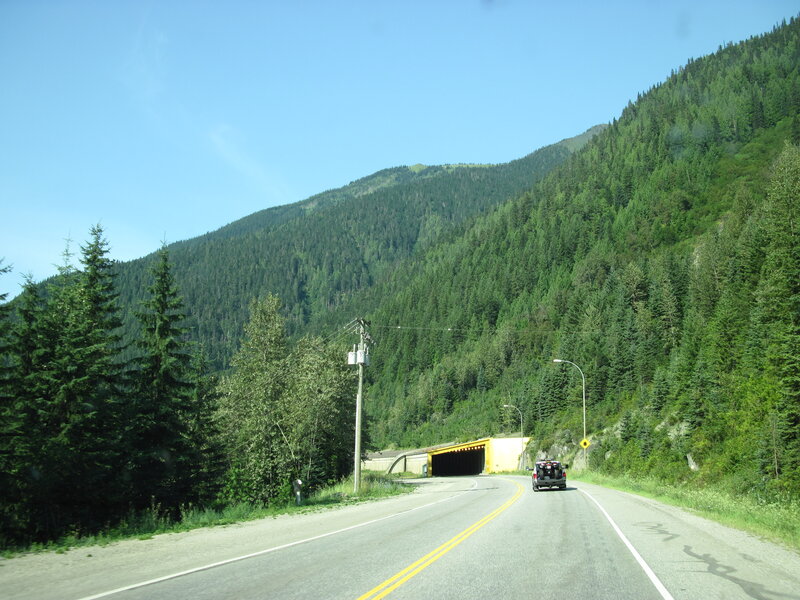 Car on Mountain Road — Green, Serene, Afternoon, Photograph