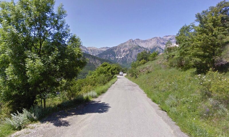 Car on Mountain Road — Green, Serene