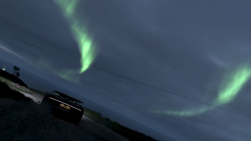 Car on Road at Night — Green
