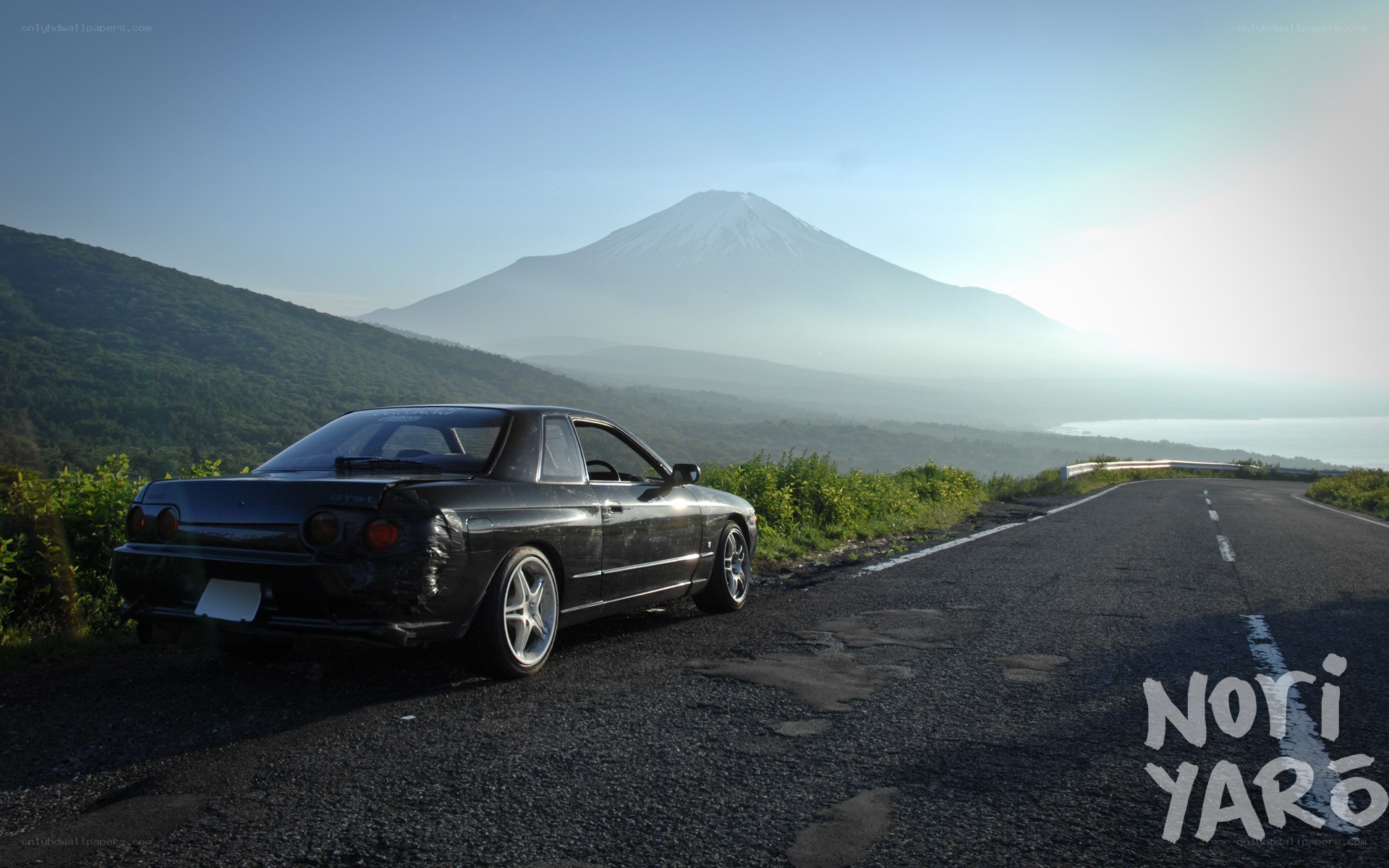 Car on road with Mount Fuji