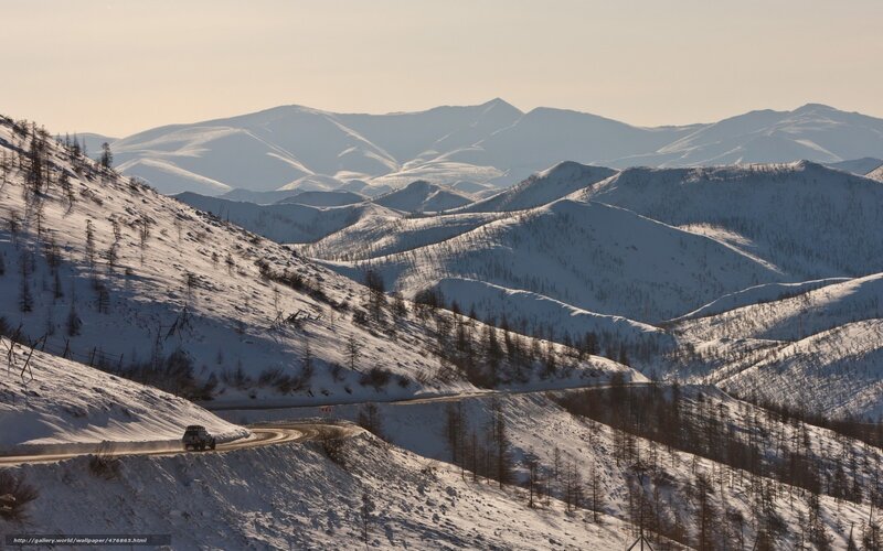 Car on Snowy Mountain Road — White