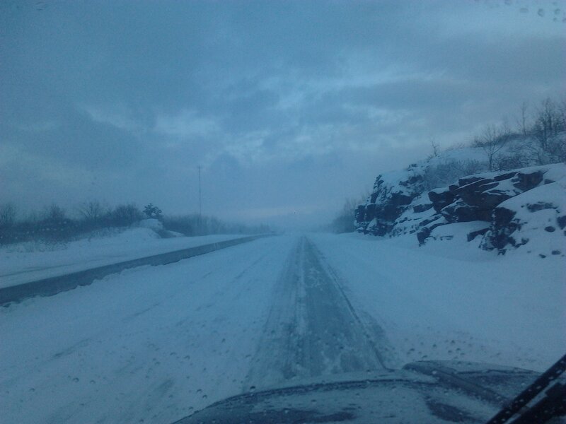 Car on Snowy Road — Blue, Cold, Overcast